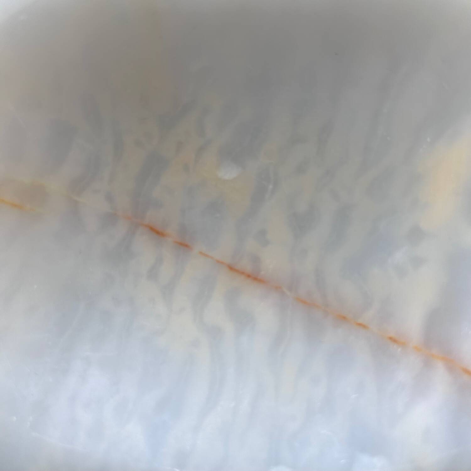 White onyx pocket emptier