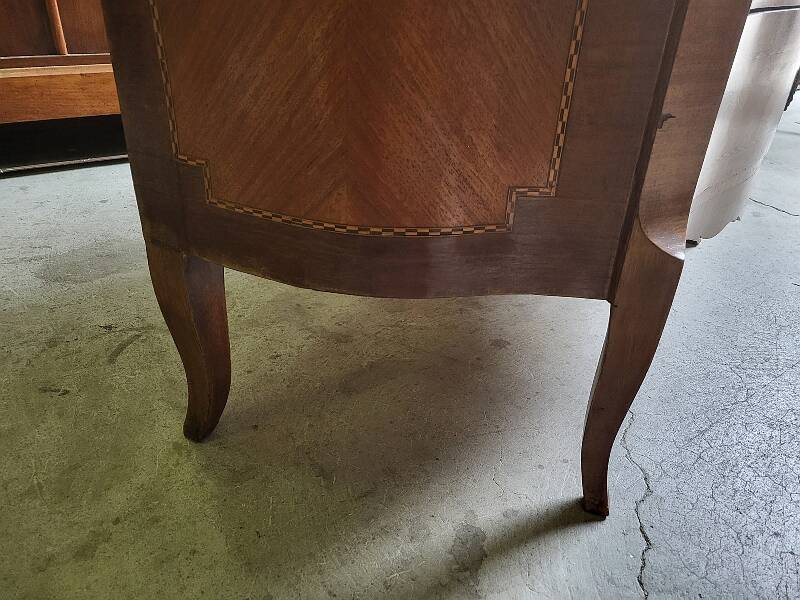 Curved chest of drawers in rosewood and marble marquetry