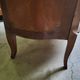 Curved chest of drawers in rosewood and marble marquetry