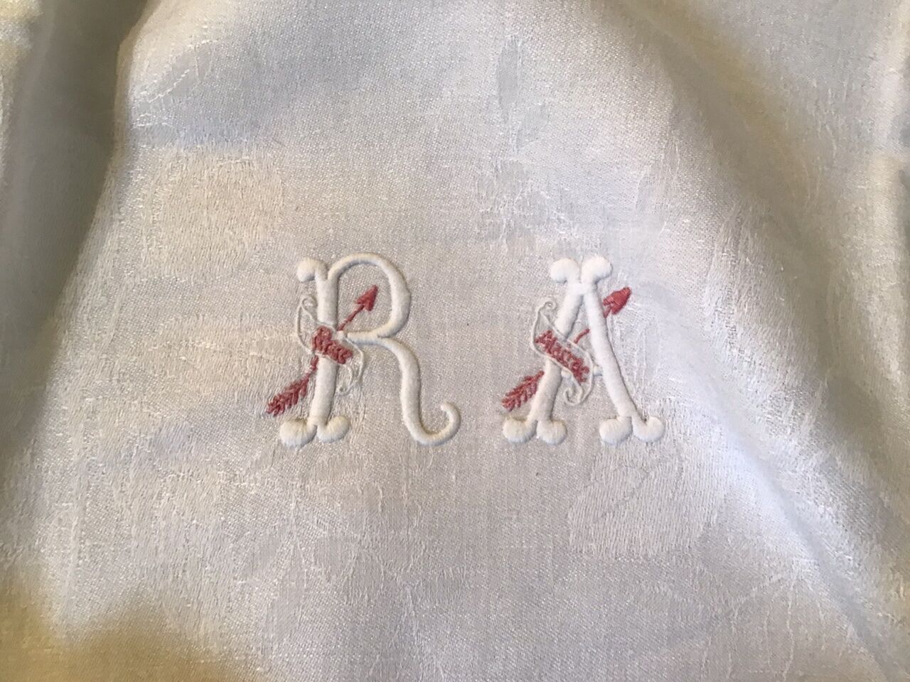 Square linen tablecloth marked RA