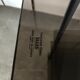 Service, TV stand on wheels in smoked glass Erard