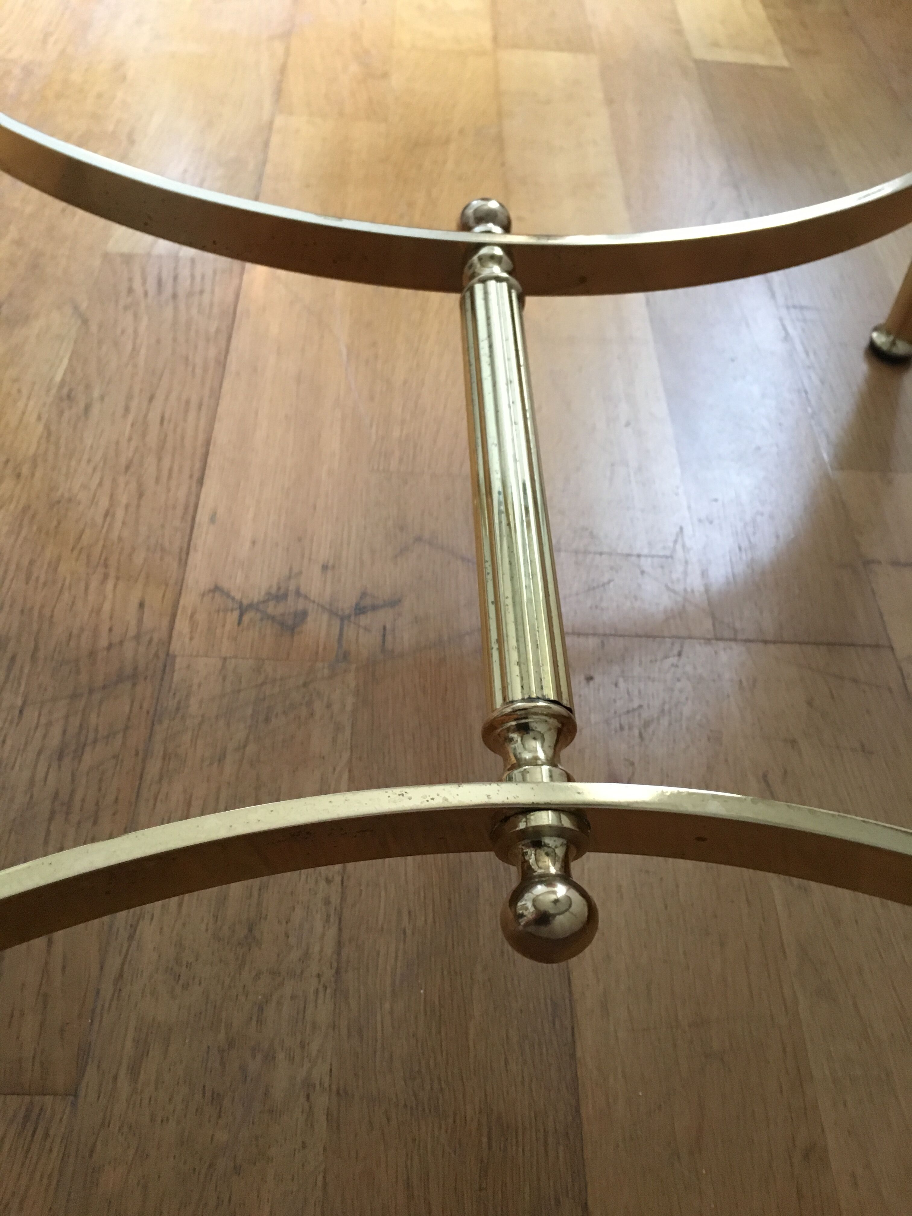 Brass round coffee table and smoked glass