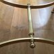 Brass round coffee table and smoked glass