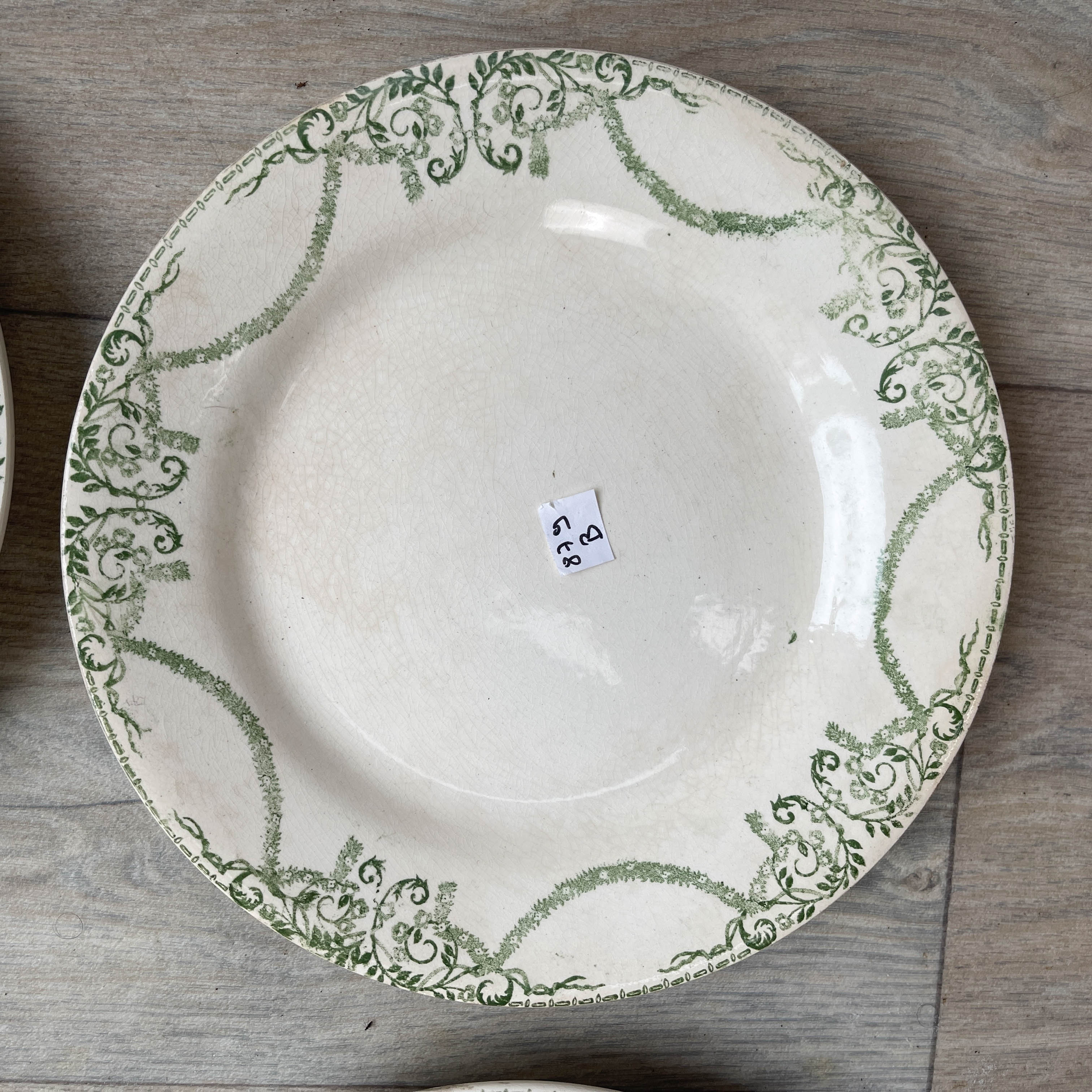 6 green and blue mismatched iron earth plates