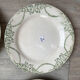 6 green and blue mismatched iron earth plates