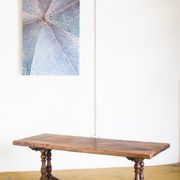 Old coffee table in solid oak wood. France, early twentieth century.