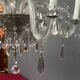 Venetian chandelier decorated with clear crystal and rare coloured crystal.