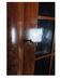 Antique North German Corner Cabinet in Late Empire in Polished Mahogany