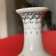 Porcelain vase decorated with flowers and birds