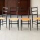Set of 8 dining chairs ‘Baletta’ by Enrico Delmonte