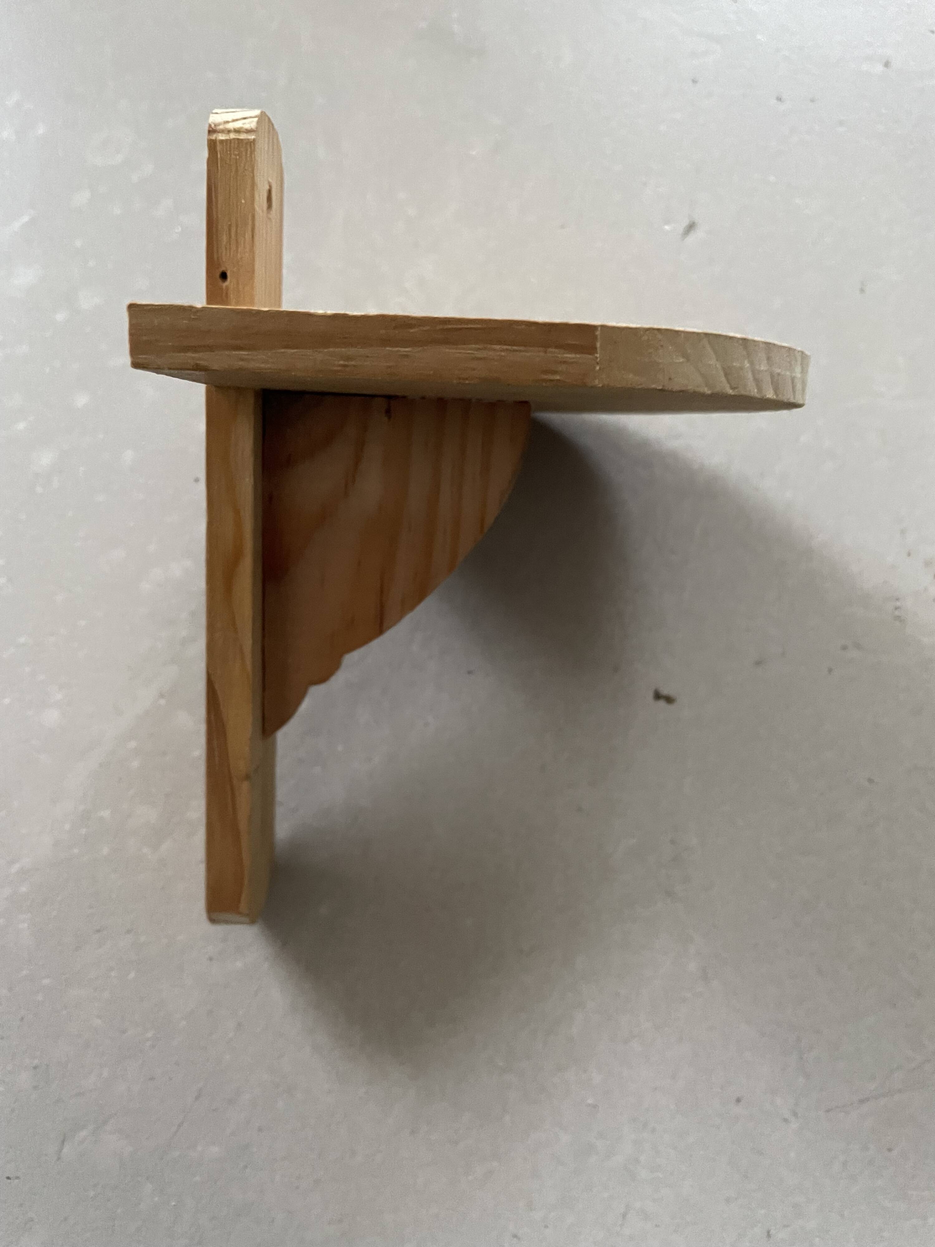Small wall-mounted wooden shelf