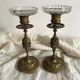 Pair of openwork brass candlesticks and glass bobeches