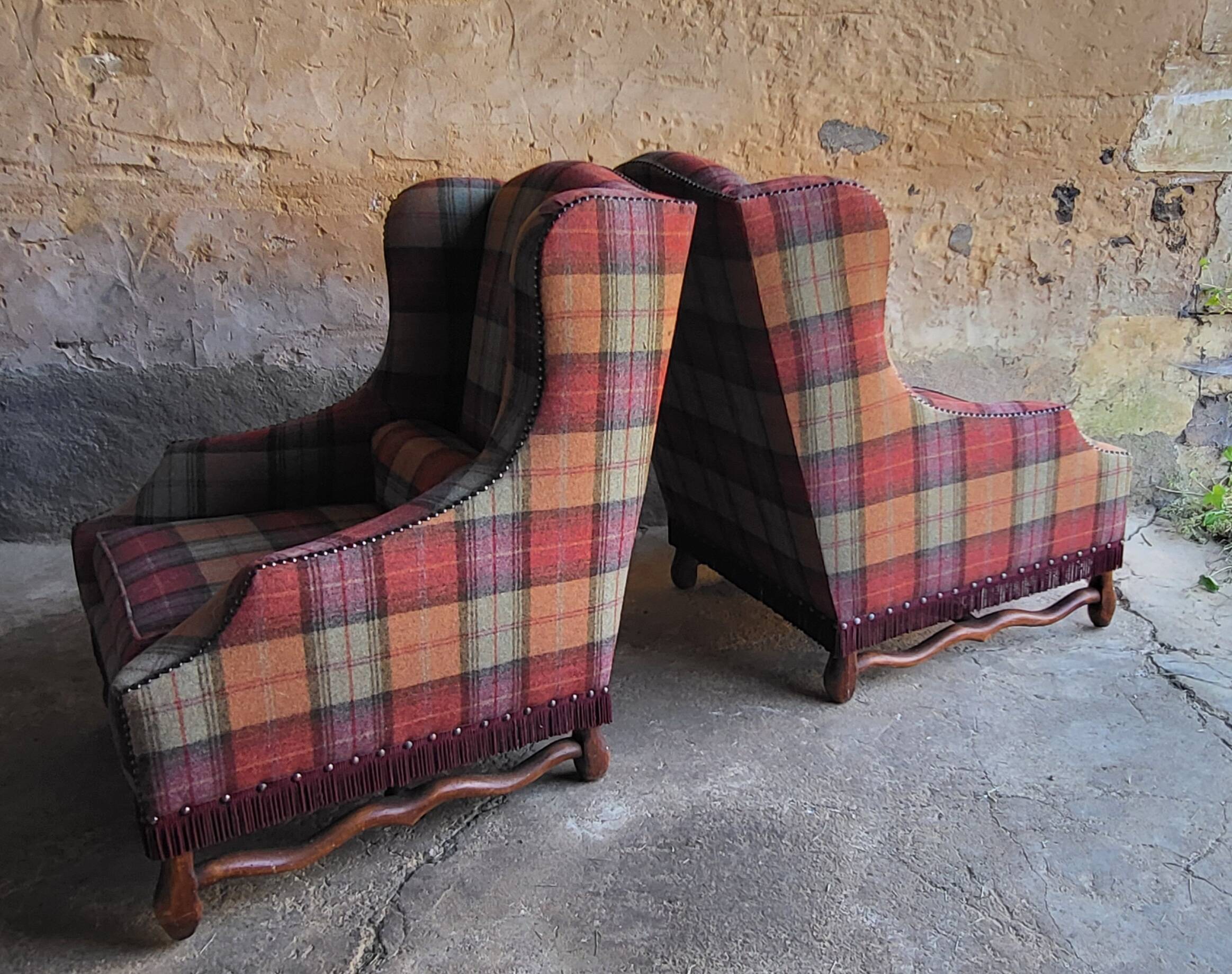 Pair of Louis XIII wingback armchairs