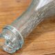 Biot blown glass bottle