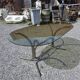 Silver metal table with smoked glass top from the 1970s.
