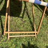 Pair of wooden deck chairs with armrests in blue bayadere fabric