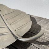Silver metal leaf pocket emptier