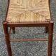 Paire de tabourets années 50 en bois et assise paillée