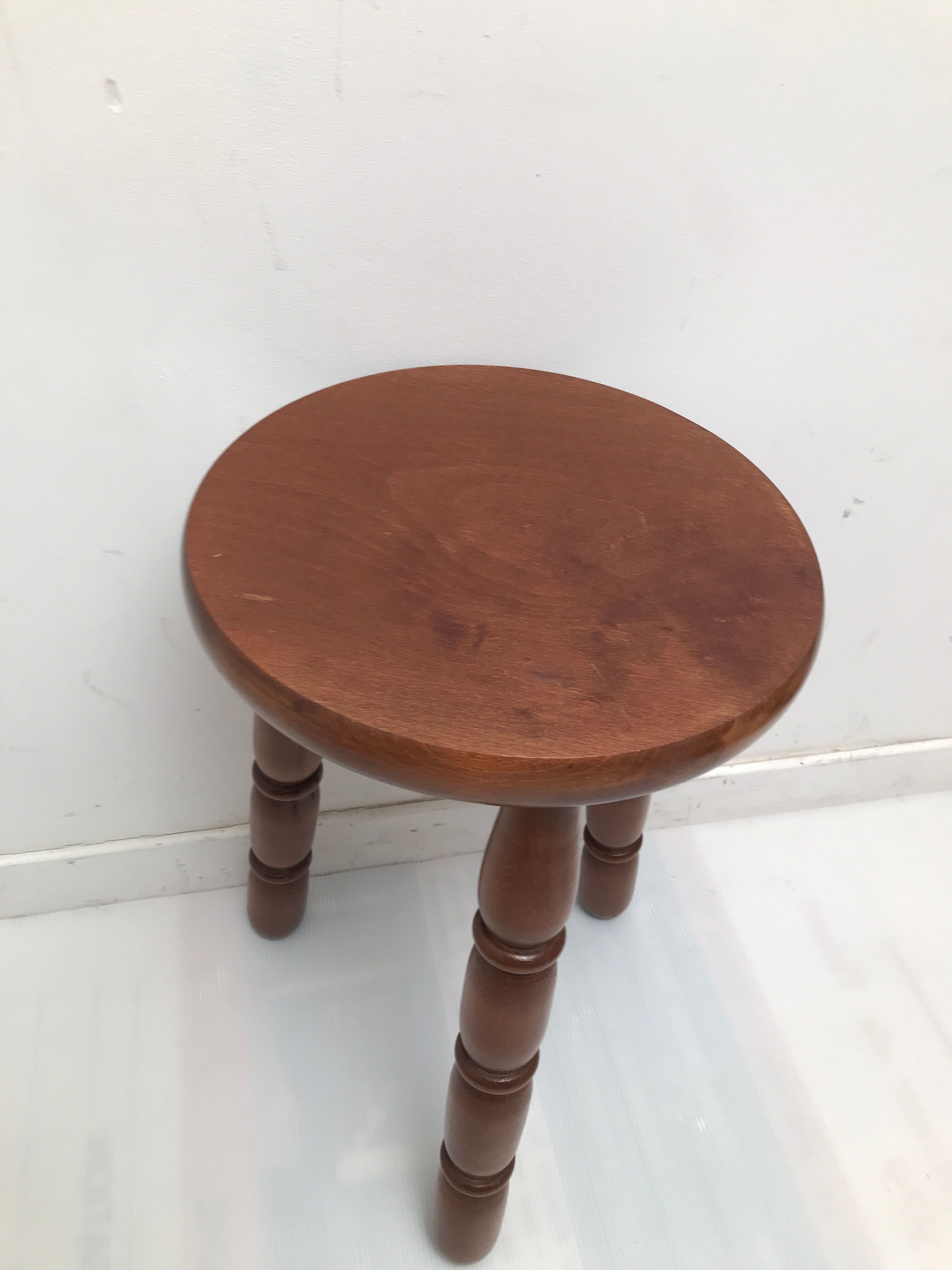 Wooden stool turned tripod foot