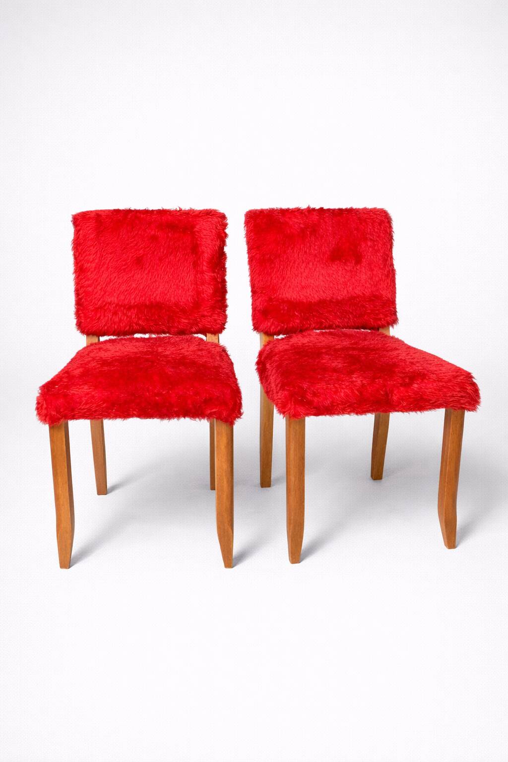 Pair of vintage wooden chairs with red fur effect upholstery – 1950