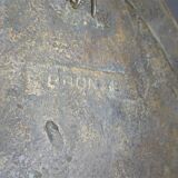 Assiette en bronze décorée d'un aigle