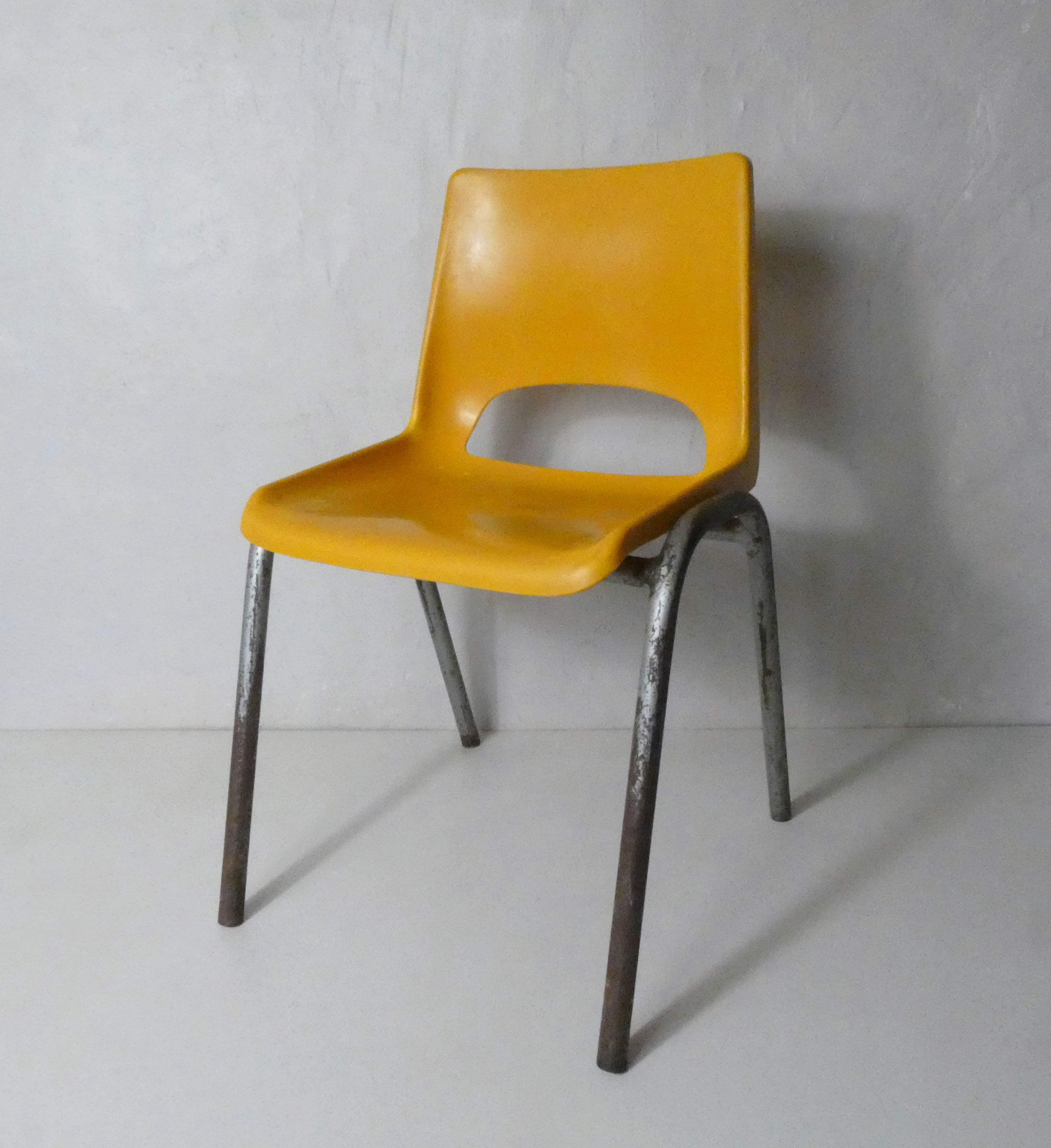 yellow plastic child chair