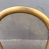 Antique brass fireplace screen from 1920, vintage spark guard.