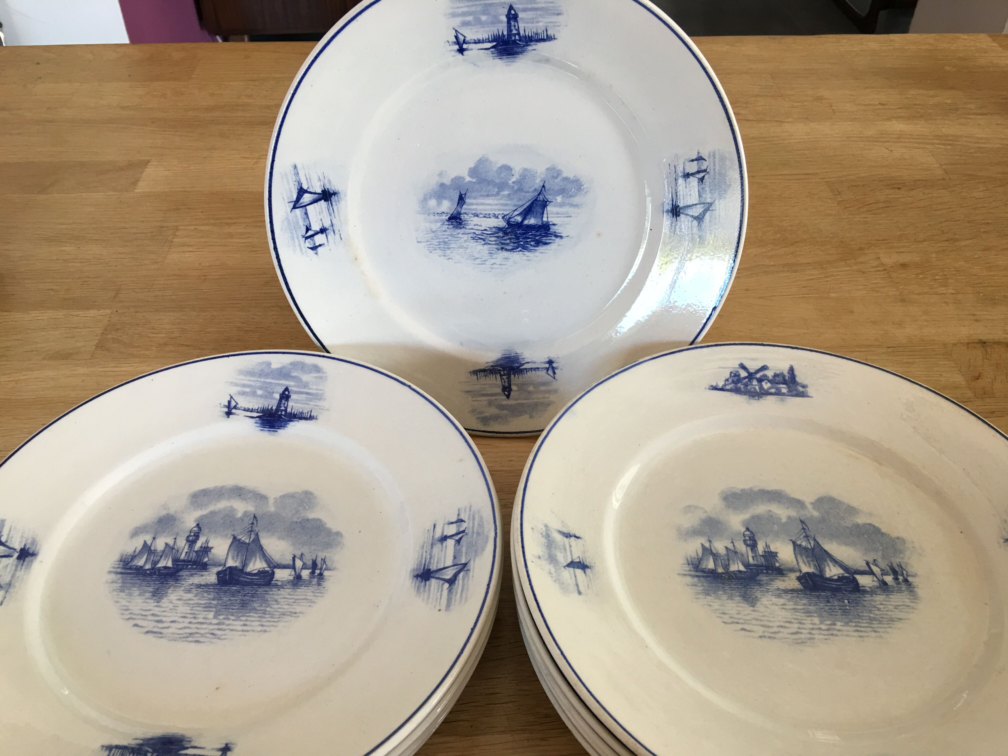 Series of 11 flat plates, Dutch earthenware, early XX