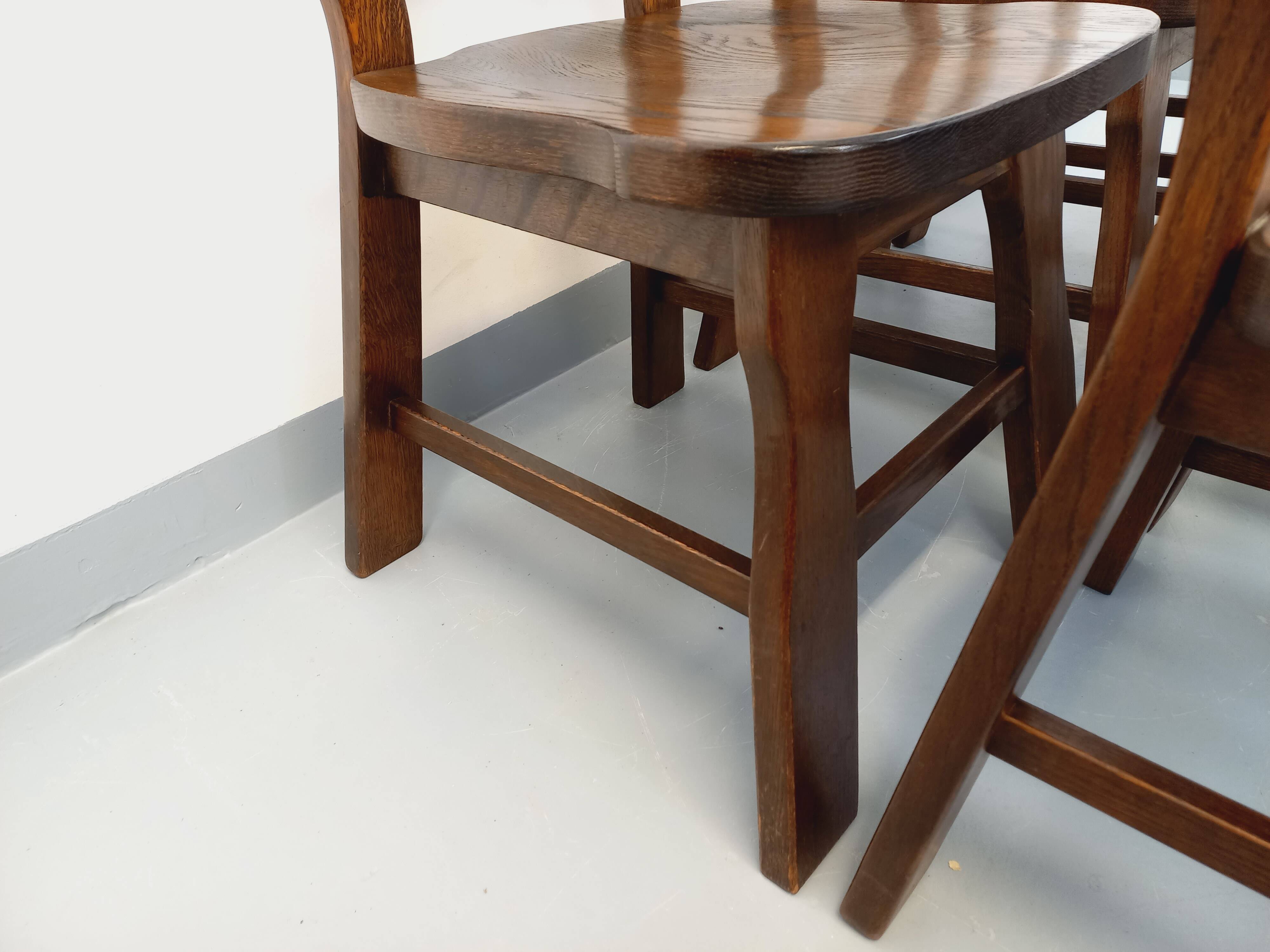 Set of 6 vintage brutalist oak chairs from the 1950s.