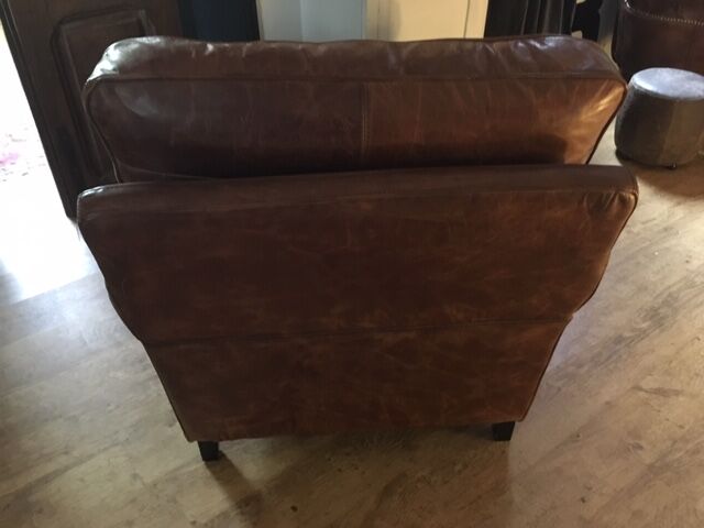 Old cuir club armchair