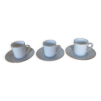 Suite de 3 tasses en porcelaine de Limoges