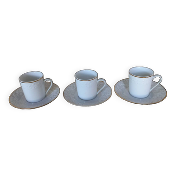 Suite de 3 tasses en porcelaine de Limoges