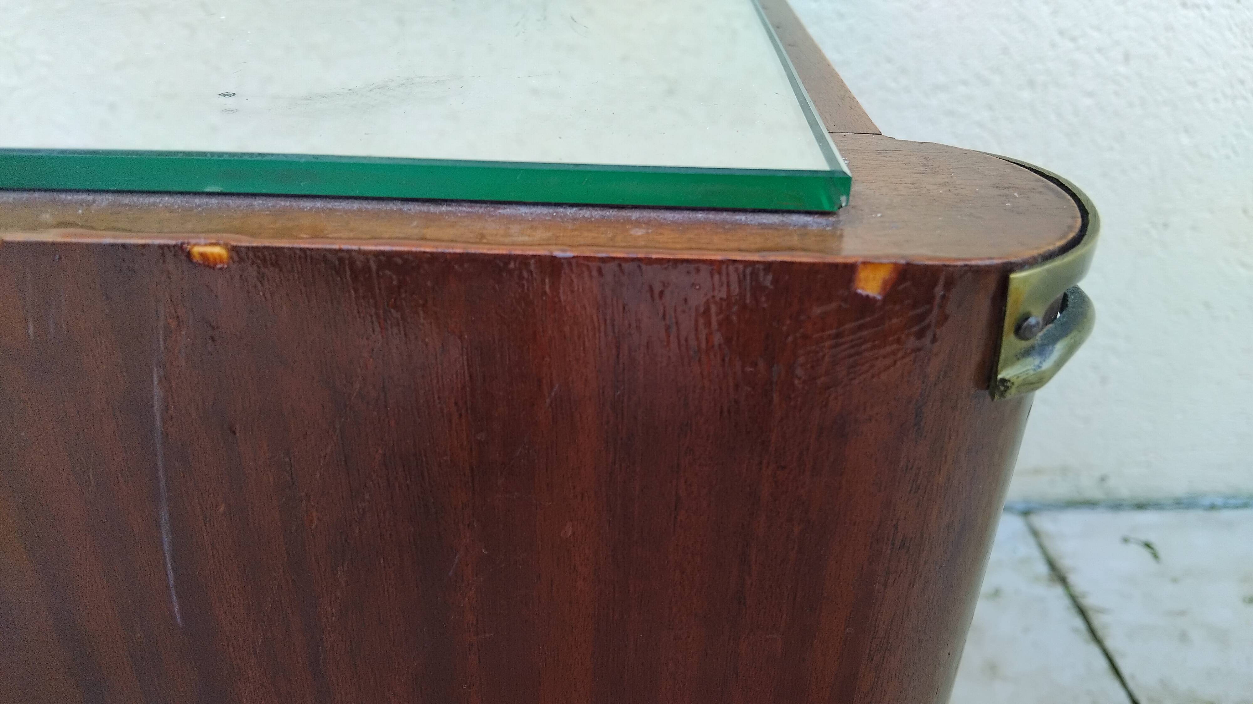 Vintage bedside table with a mirrored top, Art Deco style.