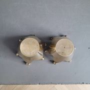 Pair of crown candle holders in brass