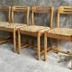 Serie de 4 chaises paillées en bois clair - design 1970
