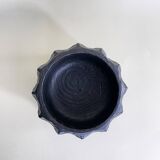 Brutalist wooden pocket emptier