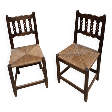 Pair of antique straw-seated farm chairs