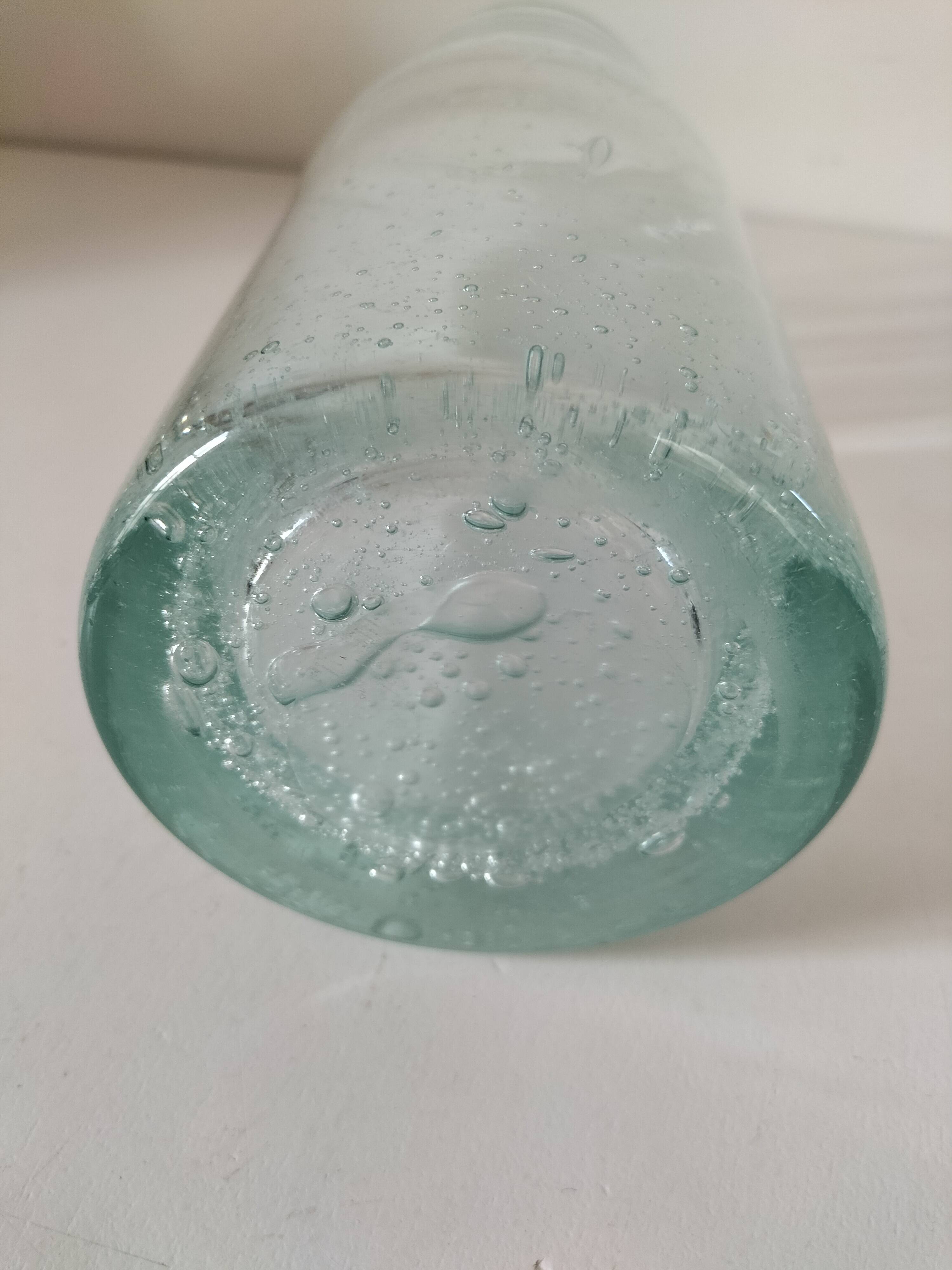 Vintage vase in very pale green bubbled glass, handcrafted