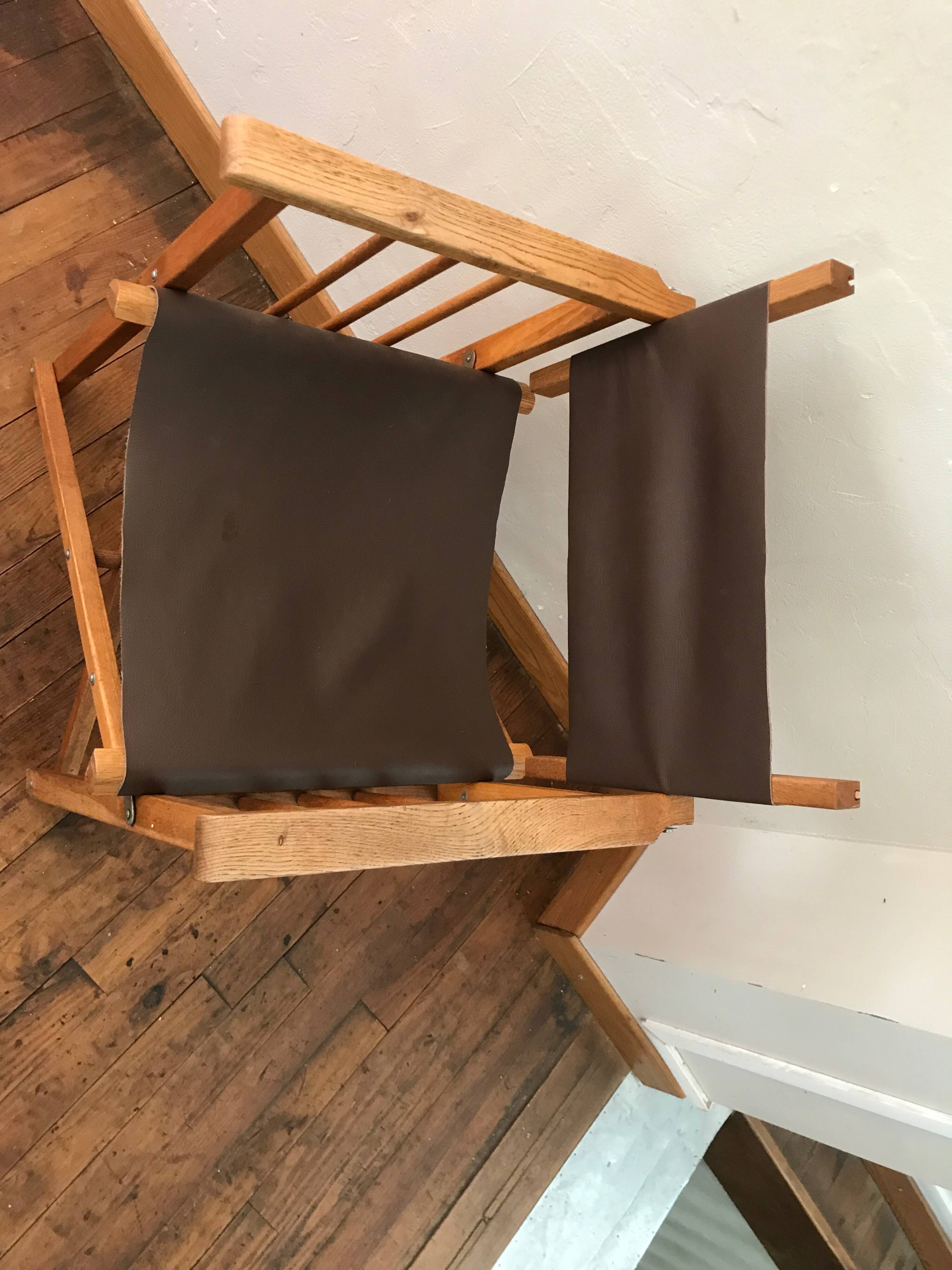 pair of Safari armchairs in wood and leather