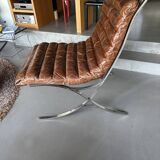 Pair of brown leather armchairs