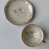 Set of mismatched fine porcelain cups signed with saucer