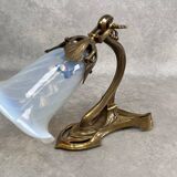 Art Nouveau wall sconces with opalescent iridescent glass