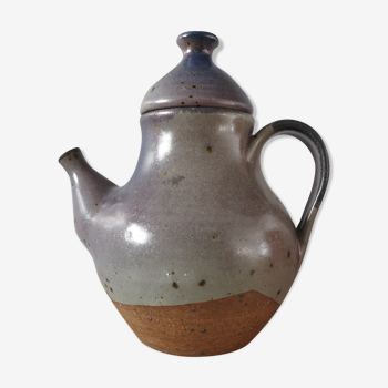 Lidded sandstone carafe