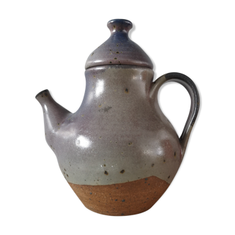 Lidded sandstone carafe