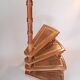Library spiral staircase in beech and brown leather.