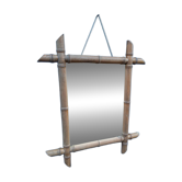Antique wall mirror with a wooden frame