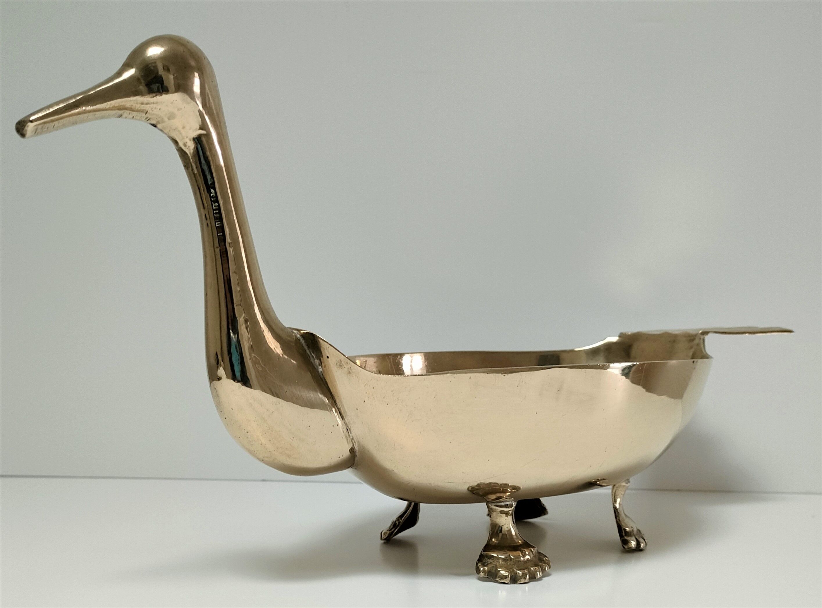 Zoomorphic cut brass bird 70s