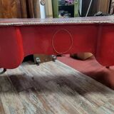 Louis XV style curved center desk in red lacquer and gilded bronze
