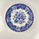 Antique blue earthenware dish with floral and bird decoration, early 20th century