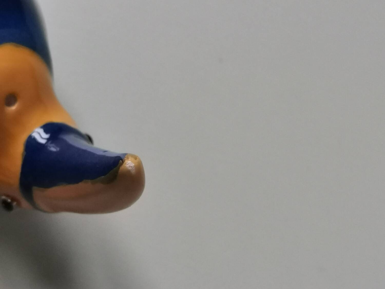 Vintage salt shaker in the shape of a toucan bird slip